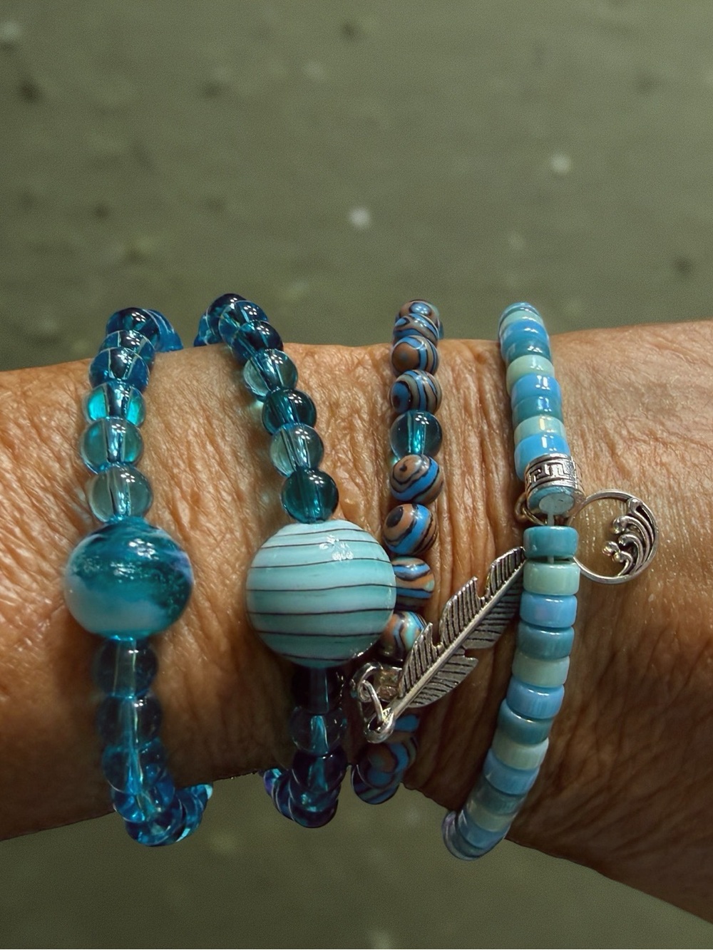 Hand Crafted Turquoise and Aqua Beaded Bracelet Set with Feather Charm